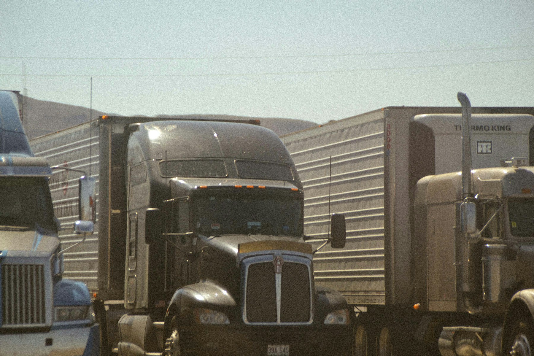 Semi trucks parked together in Arizona